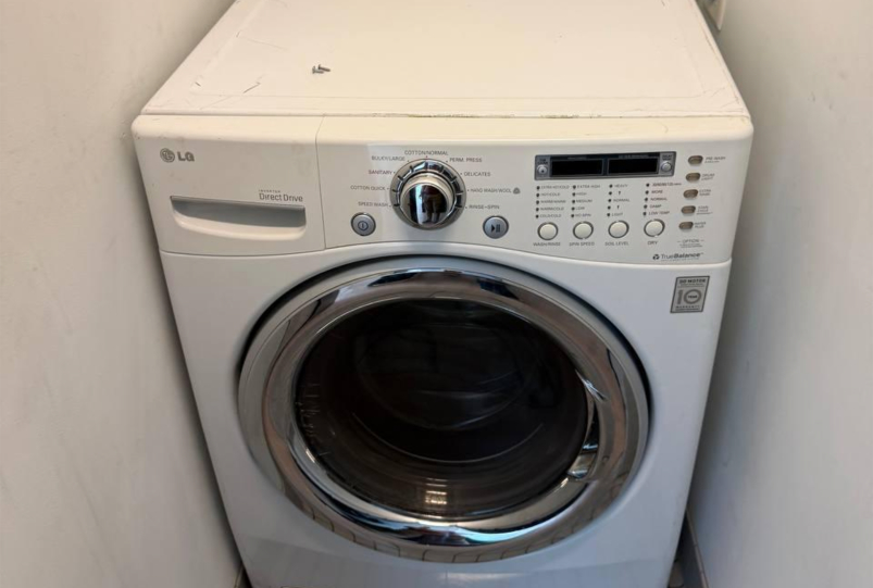 LG front-load washer leak repaired; lower section serviced and watertight operation verified.